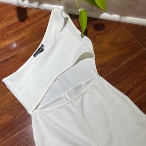Pretty Little Thing white bodysuit bodycon cut out in the front one shoulder.